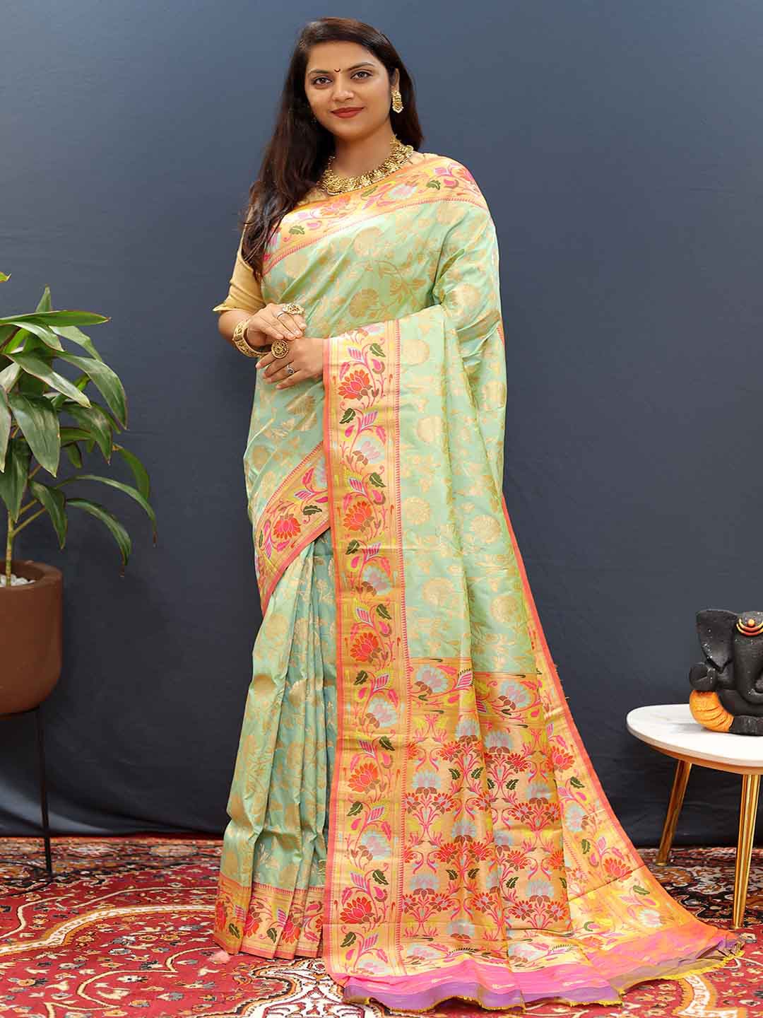 

Mitera Green & Pink Floral Zari Art Silk Saree