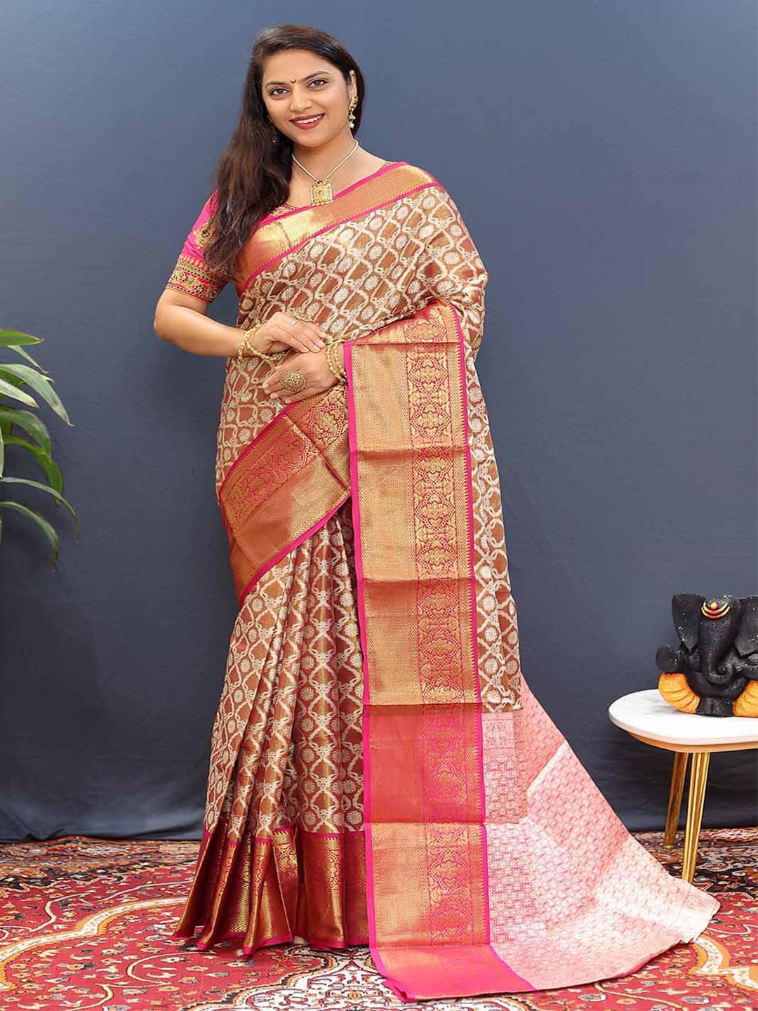 

Mitera Brown & Pink Woven Design Zari Art Silk Saree