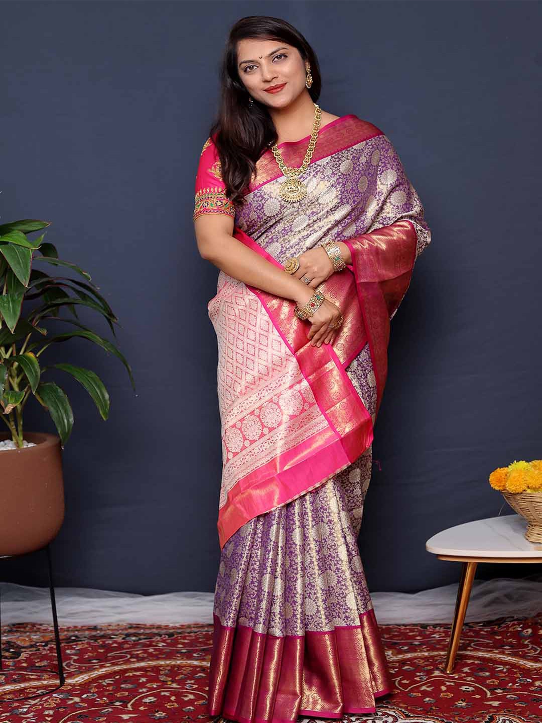 

Mitera Purple & Pink Floral Zari Art Silk Saree
