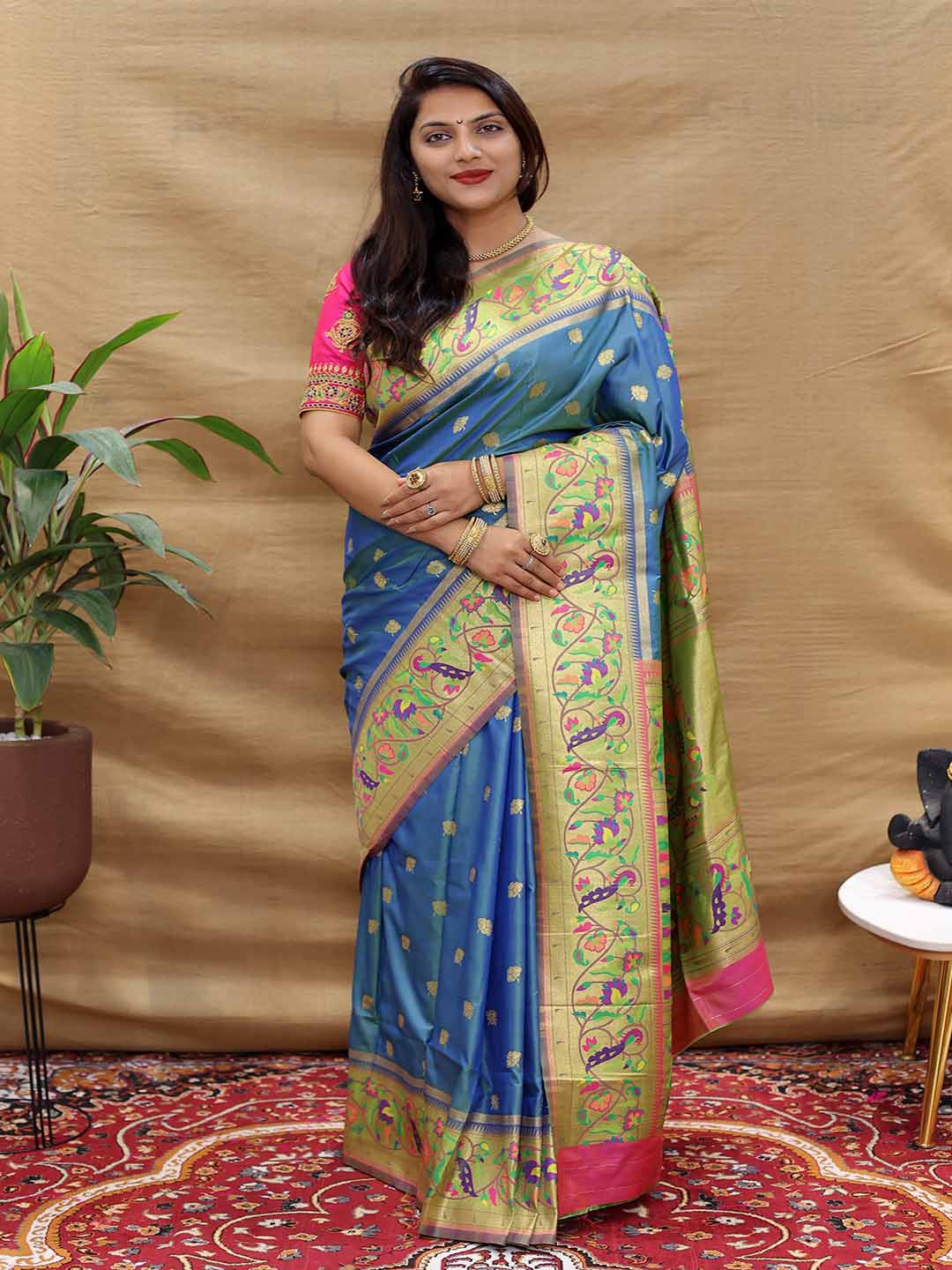 

Mitera Blue & Gold Toned Woven Design Ethnic Motifs Zari Art Silk Saree