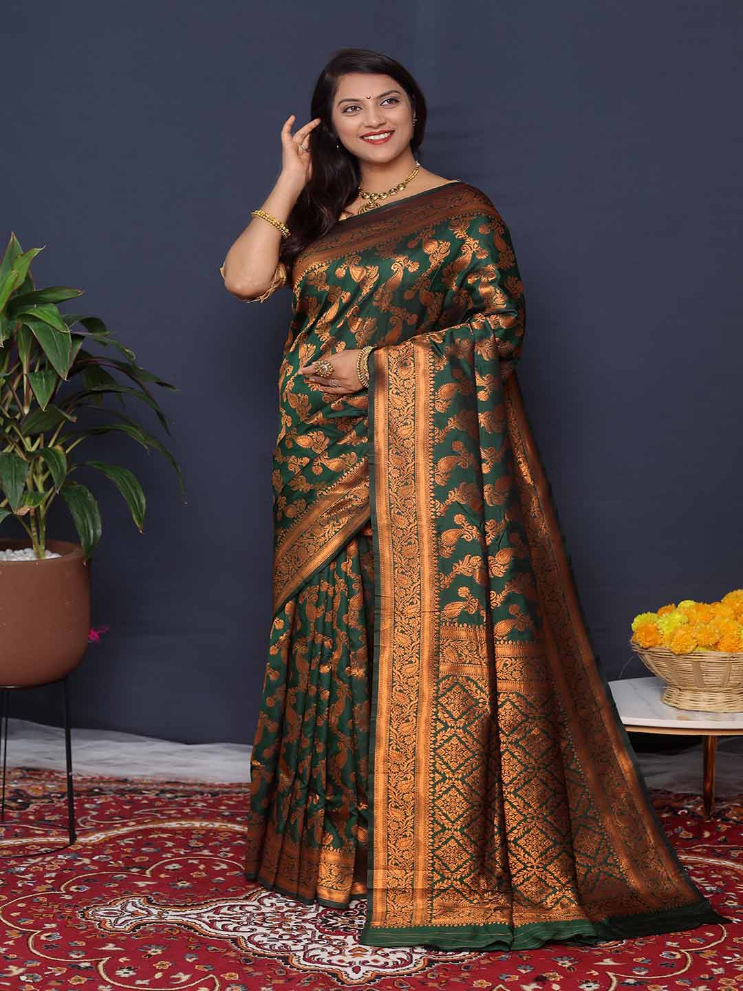 

Mitera Green & Copper Toned Woven Design Zari Art Silk Saree