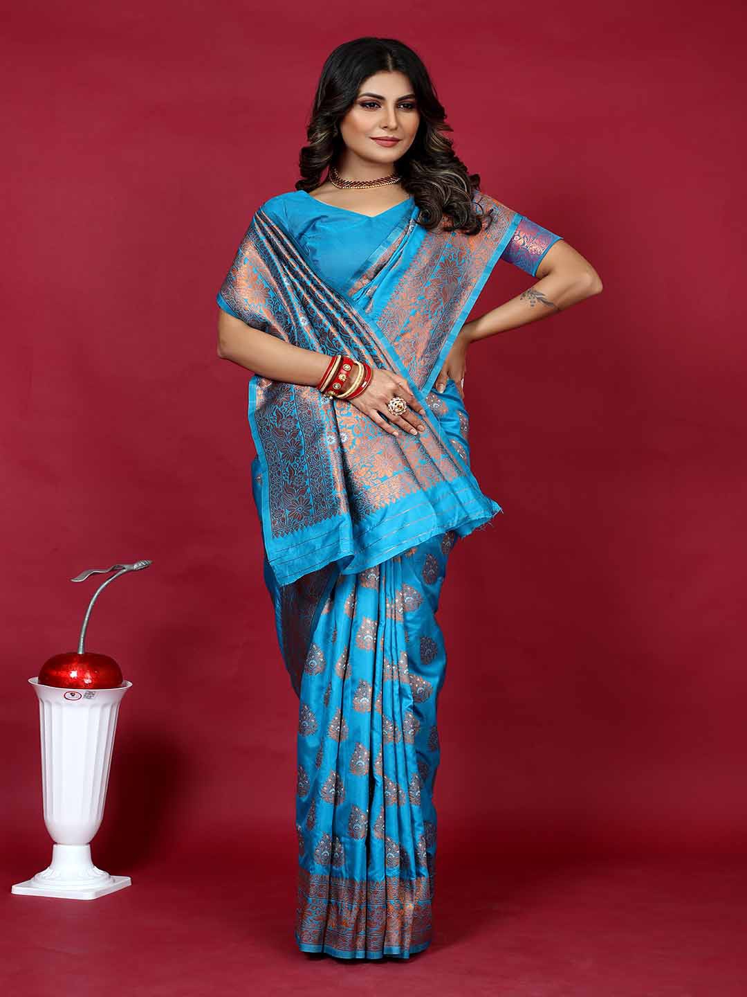 

Mitera Blue & Copper Toned Woven Design Ethnic Motifs Zari Art Silk Saree