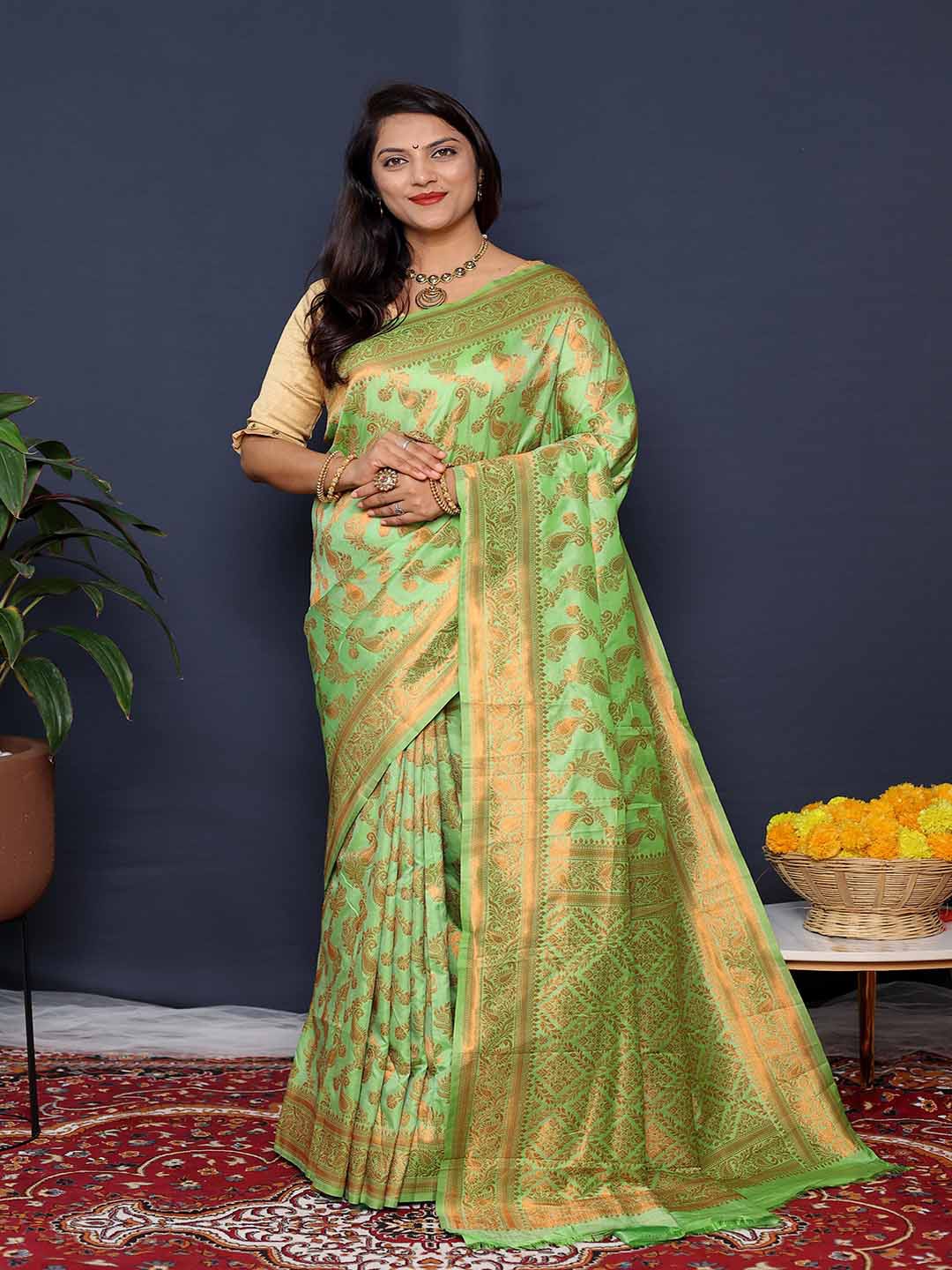 

Mitera Green & Gold Toned Woven Design Zari Art Silk Saree