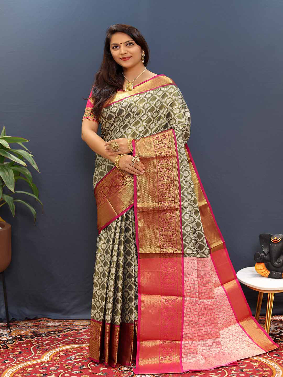 

Mitera Green & Purple Woven Design Zari Art Silk Saree