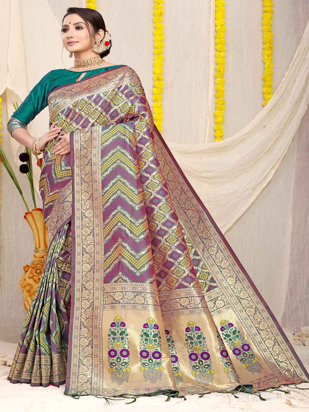 

Mitera Purple & Green Ethnic Motifs Woven Design Zari Art Silk Saree