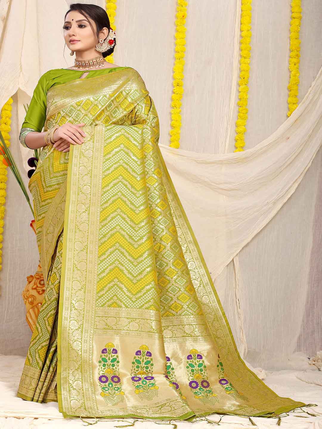 

Mitera Green & Purple Ethnic Motifs Woven Design Zari Art Silk Saree