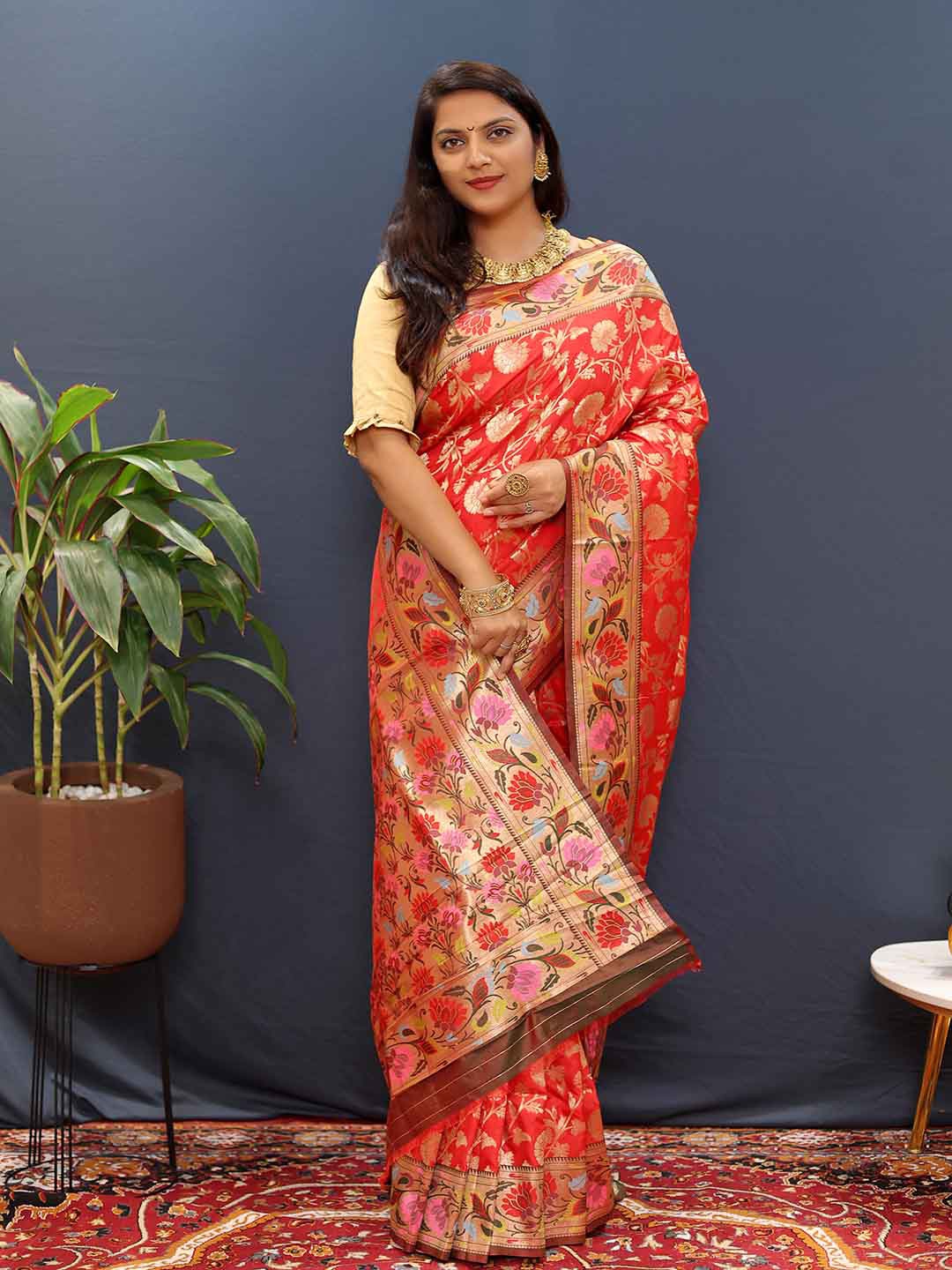 

Mitera Red & Gold-Toned Ethnic Motifs Woven Design Zari Art Silk Saree