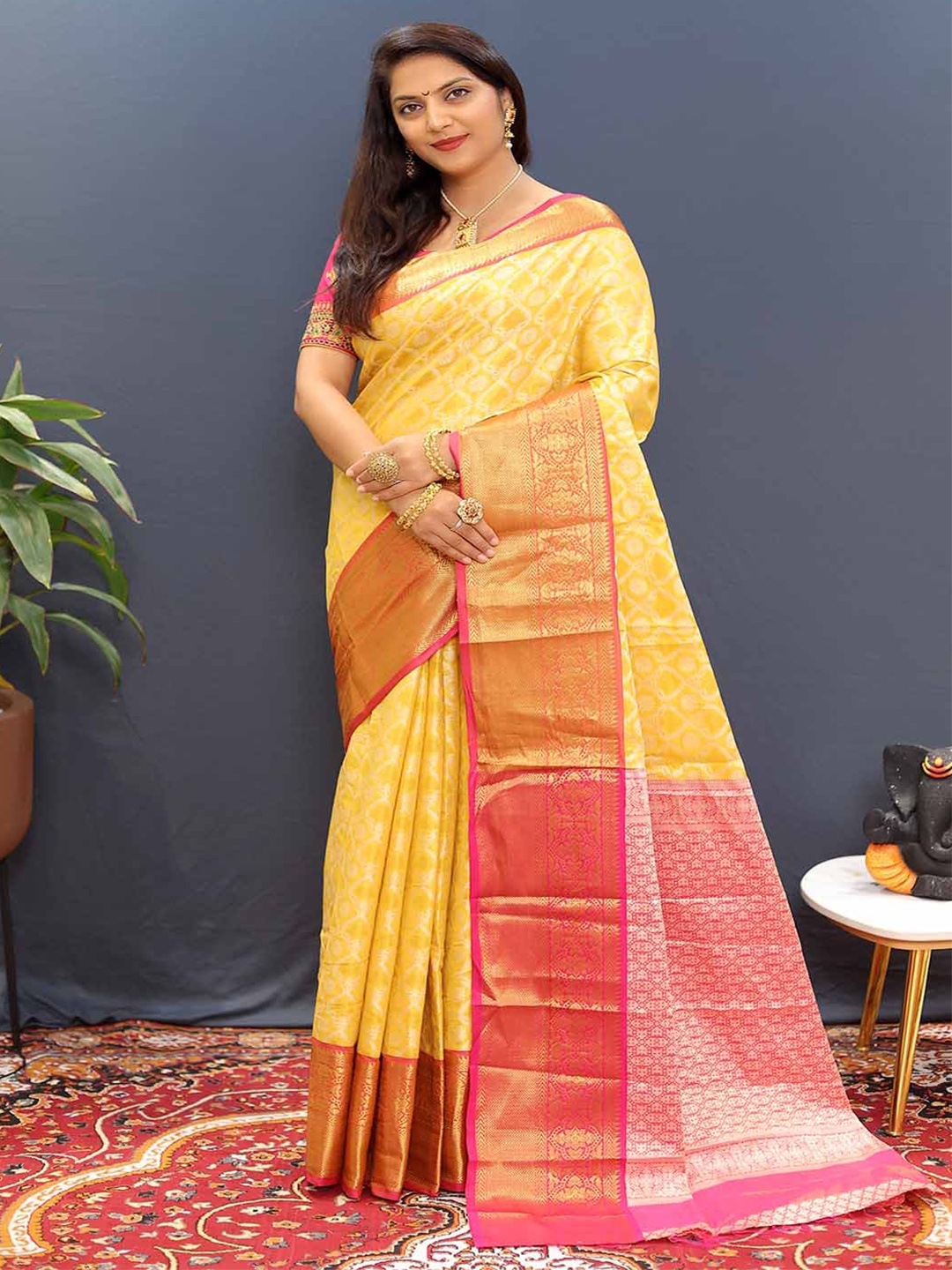 

Mitera Ethnic Motifs Woven Design Zari Saree, Yellow