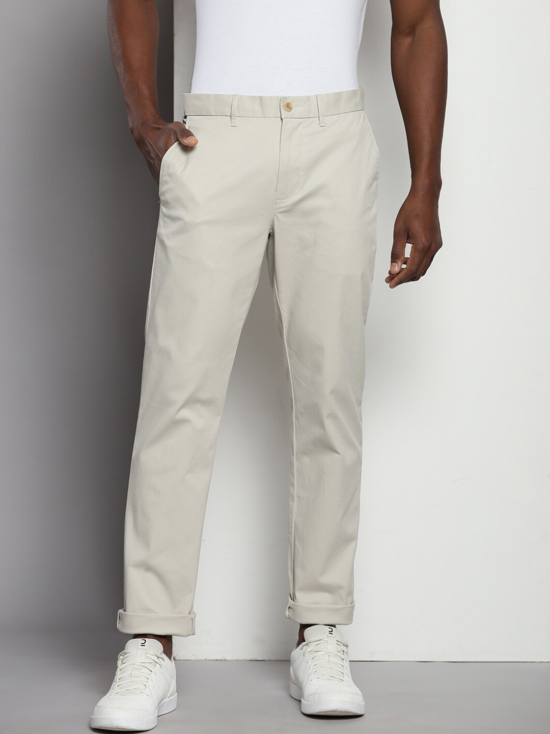 

Tommy Hilfiger Men Slim Fit Mid Rise Trousers, Beige