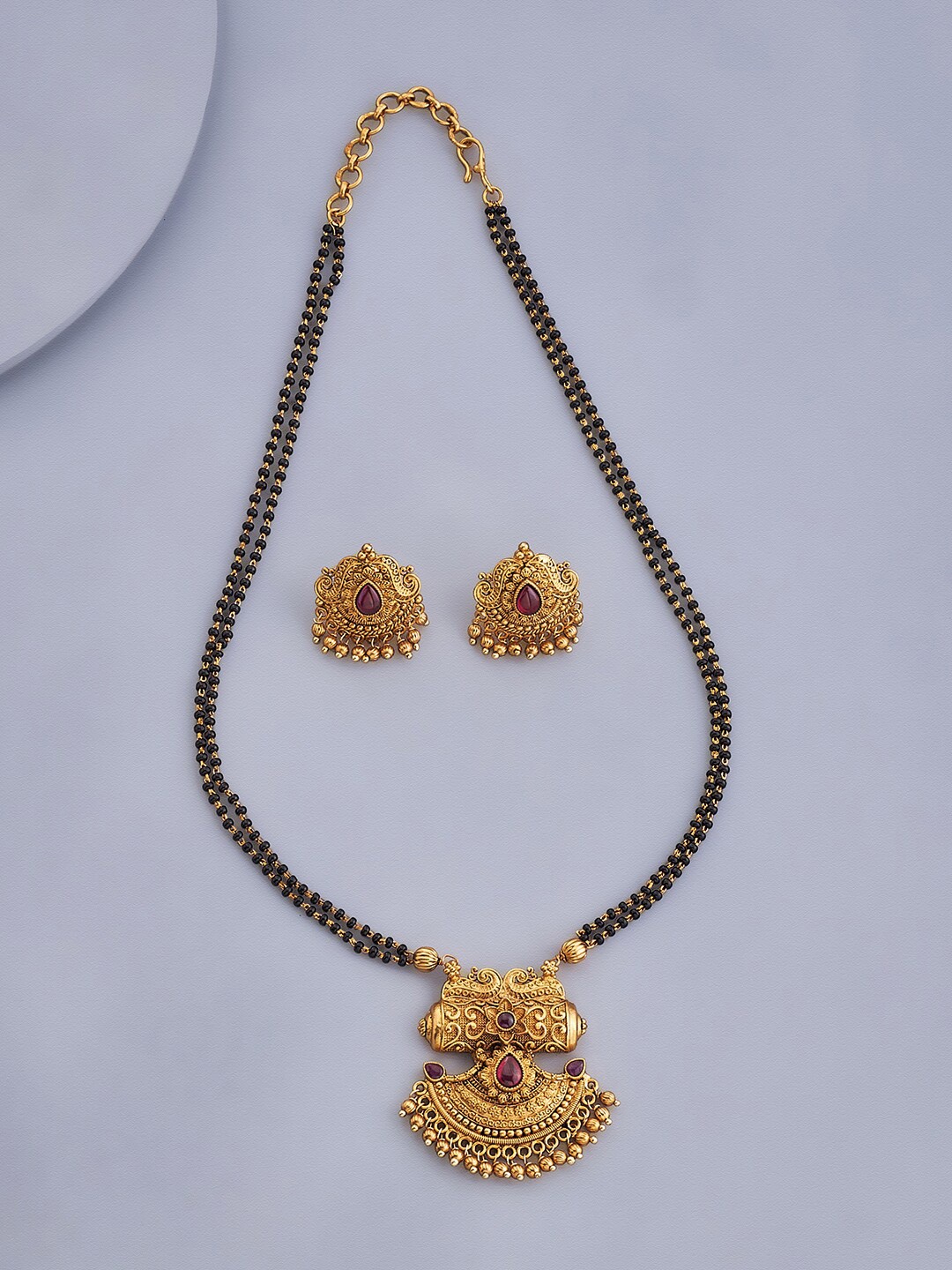 

Kushal's Fashion Jewellery Antique Stone-Studded & Black Beaded Mangalsutra & Earring, Gold