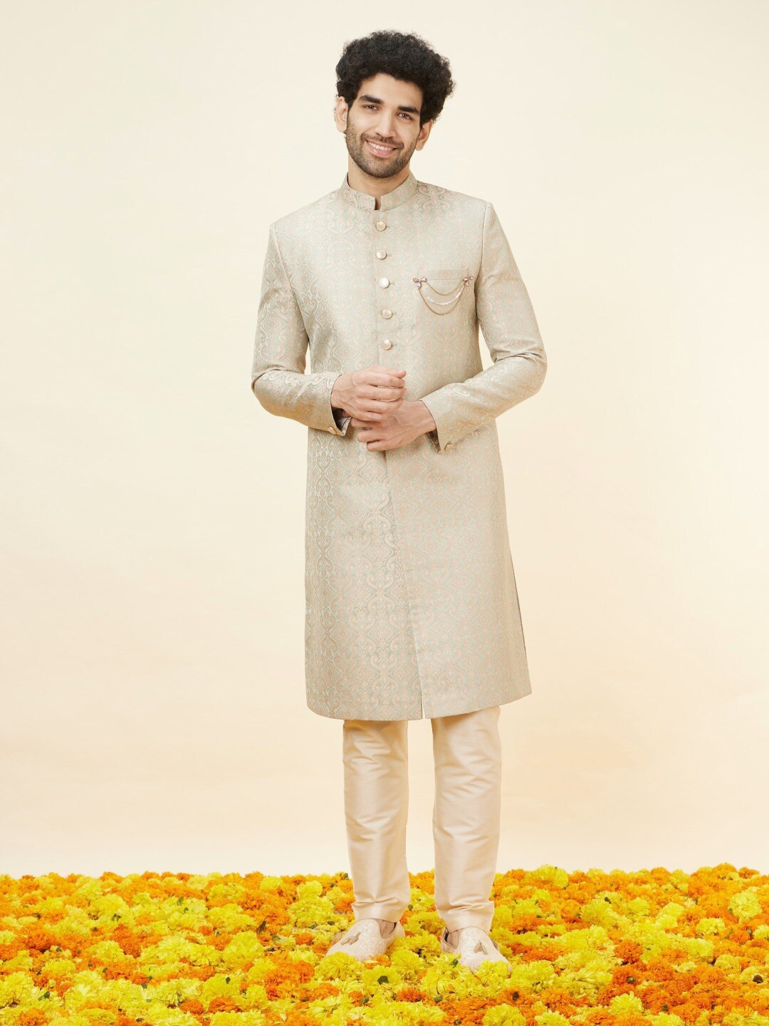 

Manyavar Self-Design Mandarin Collar Sherwani Set, Green