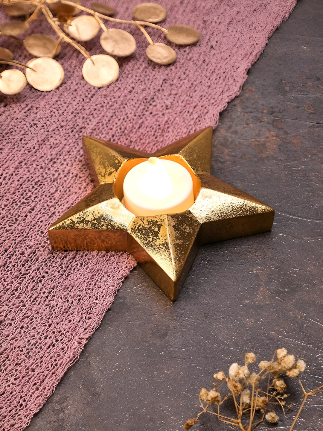 

Satyam Kraft Gold Toned Star Candle Holder
