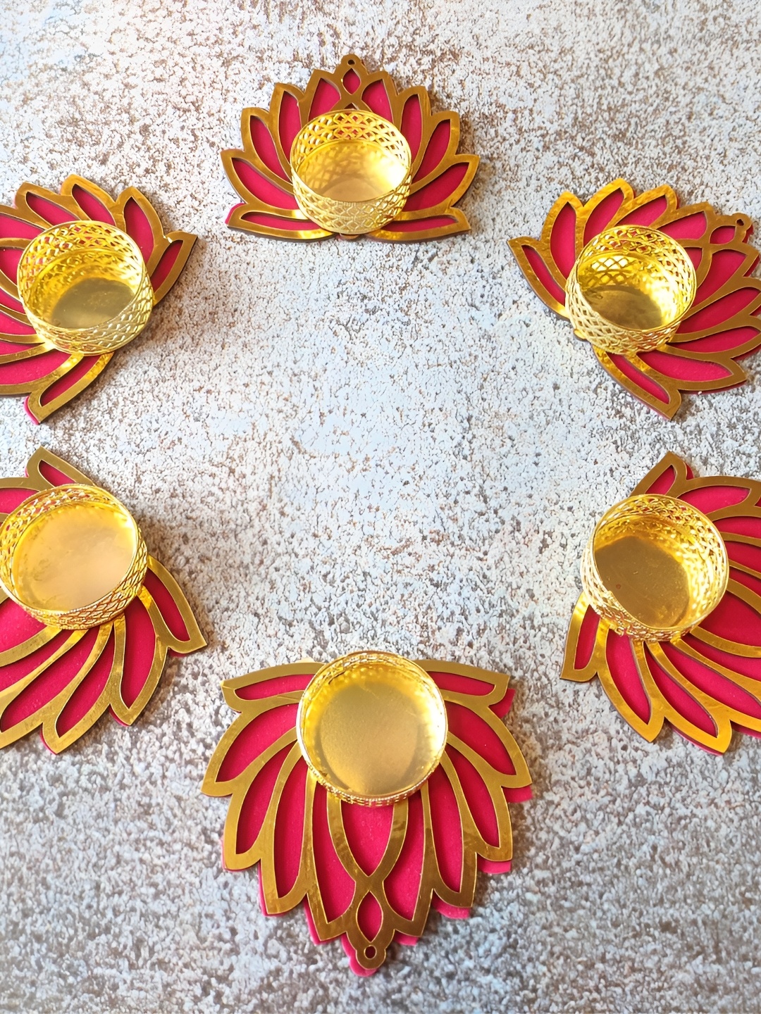 

Satyam Kraft Gold Toned 6 Pcs Lotus Candle Holder