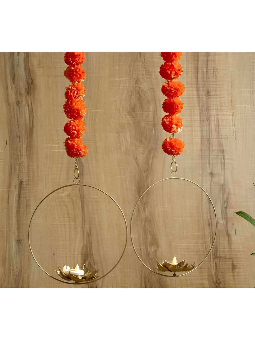 

Satyam Kraft Gold Toned 2 Pieces Lotus With Marigold Flowers