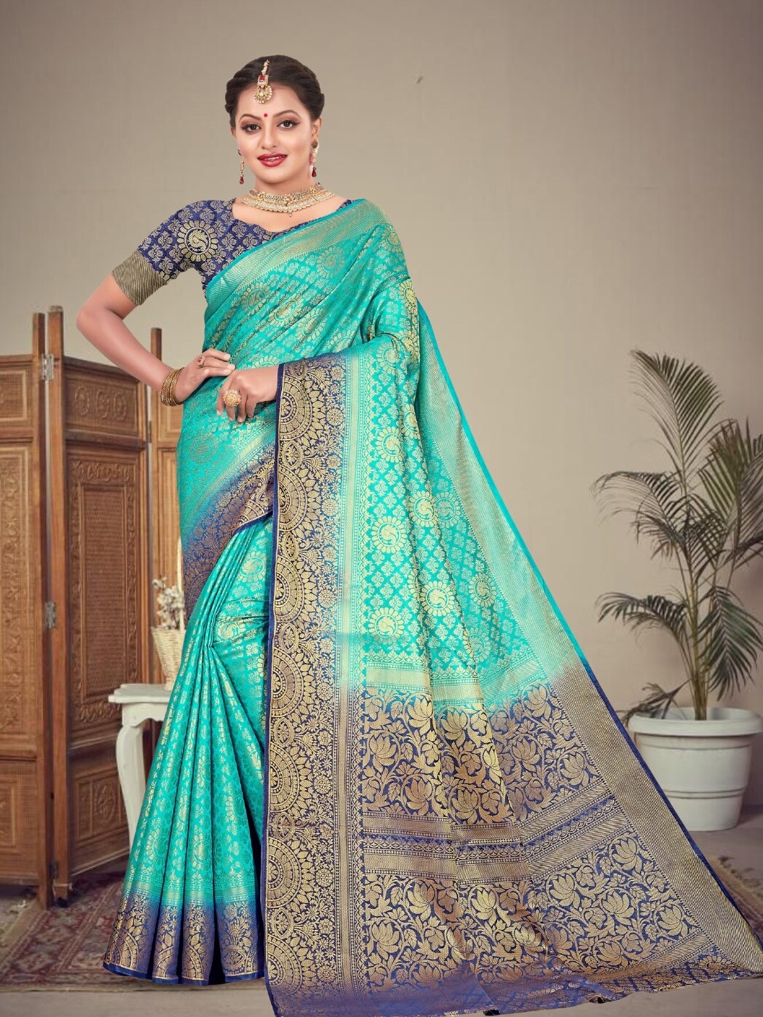 

Mitera Turquoise Blue & Green Woven Design Zari Kanjeevaram Saree