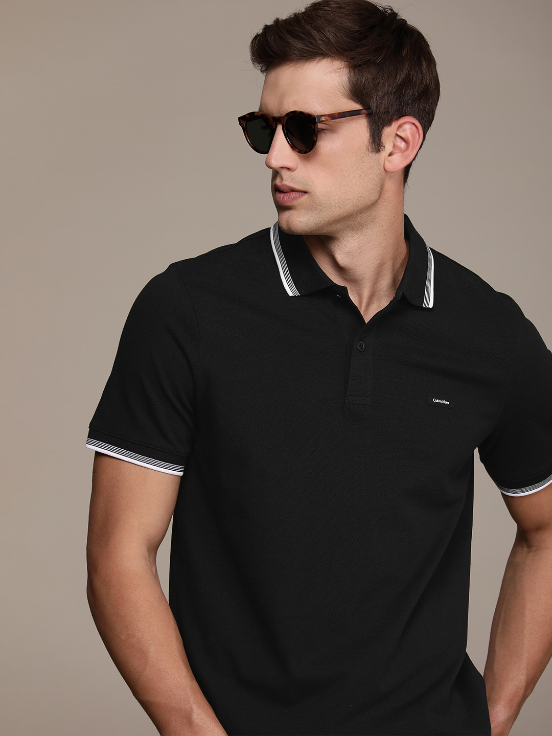 

Calvin Klein Jeans Men Polo Collar Pure Cotton T-shirt, Black