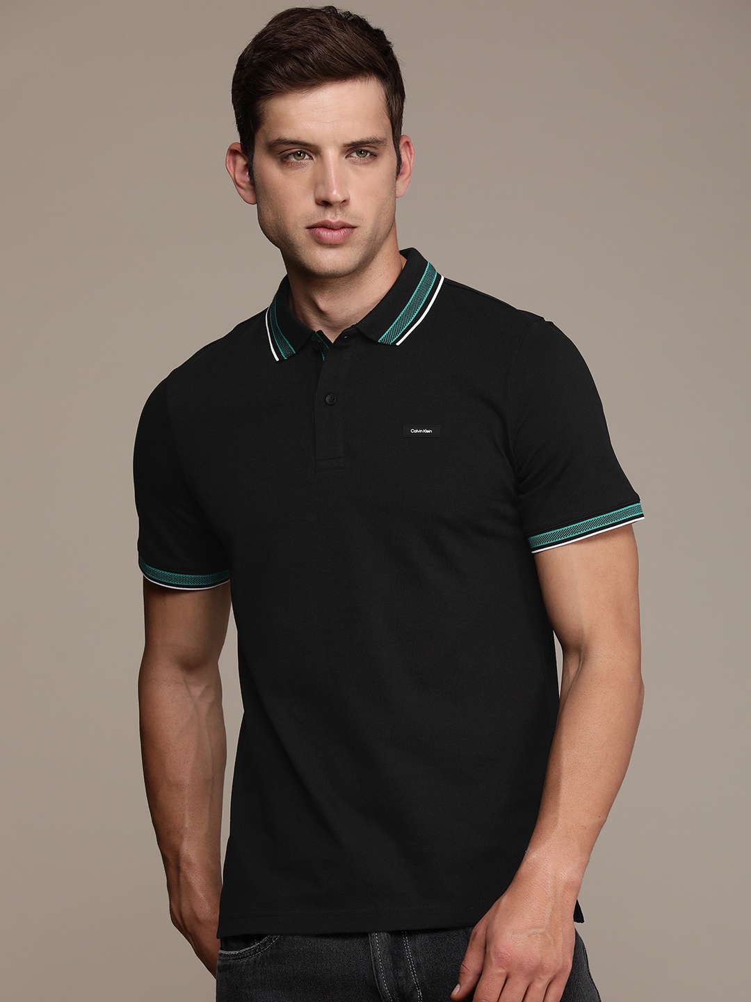 

Calvin Klein Jeans Men Polo Collar Pure Cotton Slim Fit T-shirt, Black