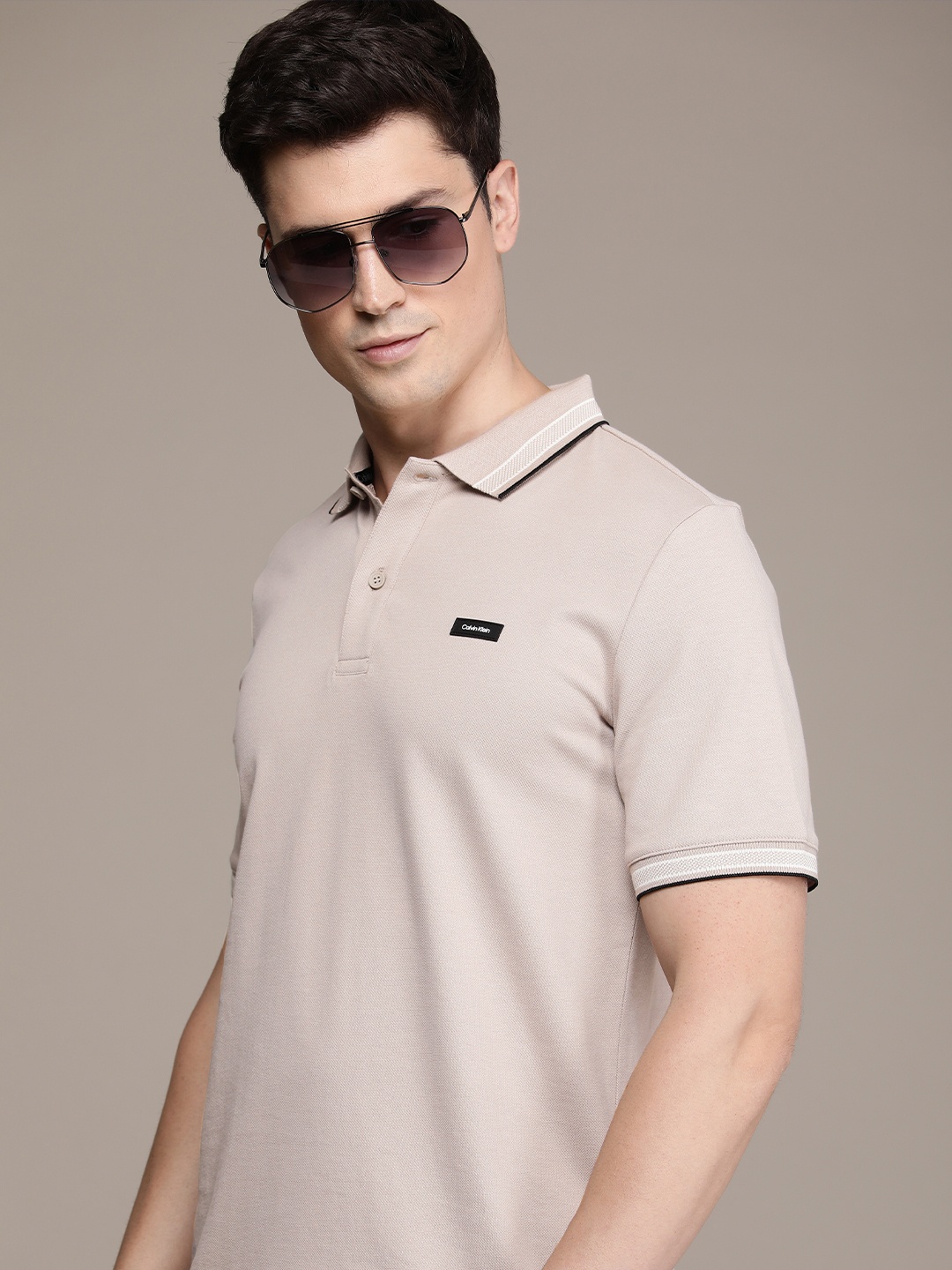 

Calvin Klein Jeans Solid Polo Collar Pure Cotton Slim Fit T-shirt, Beige