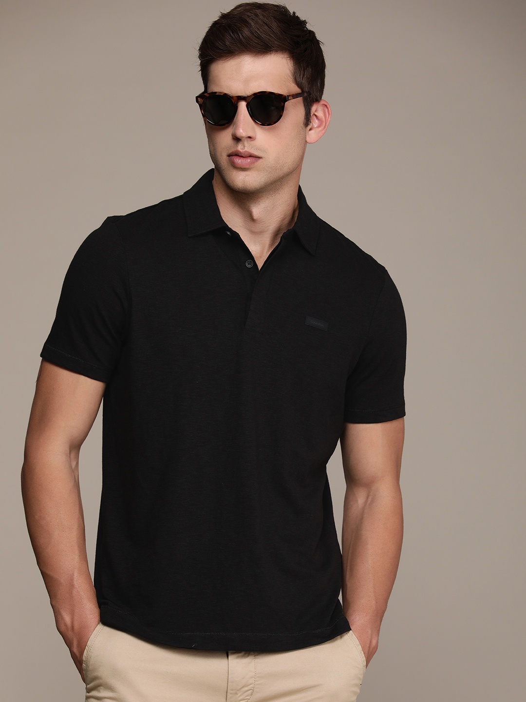 

Calvin Klein Jeans Men Polo Collar Pure Cotton T-shirt, Black