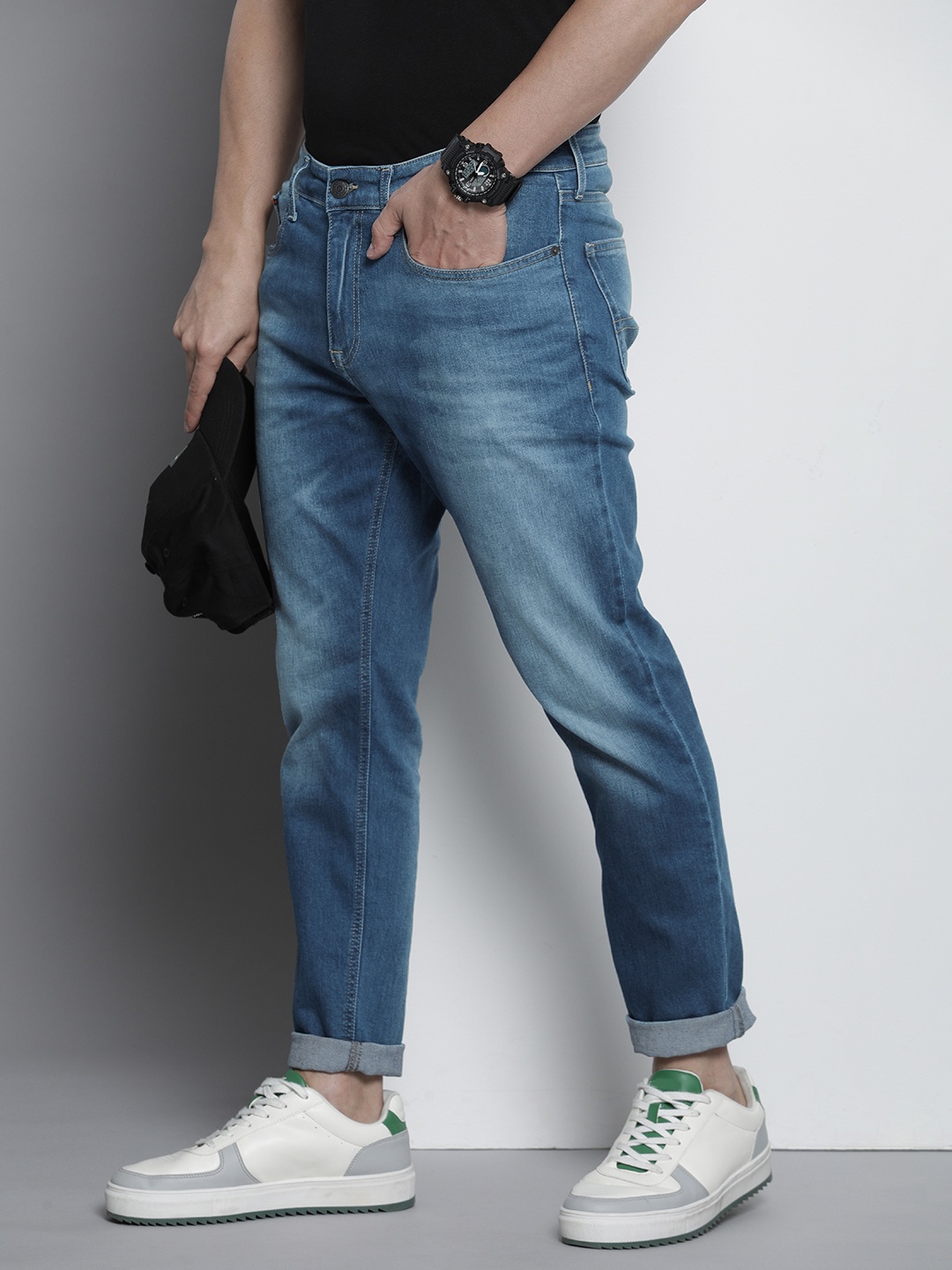 

Tommy Hilfiger Men Mid Rise Slim Tapered Fit Stretchable Jeans, Blue