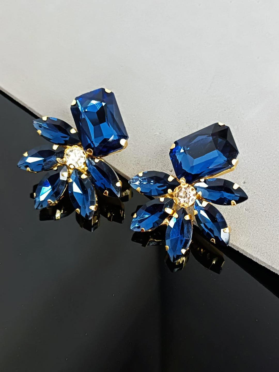 

Efulgenz Gold-Plated Crystals Studded Floral Shaped Drop Earrings