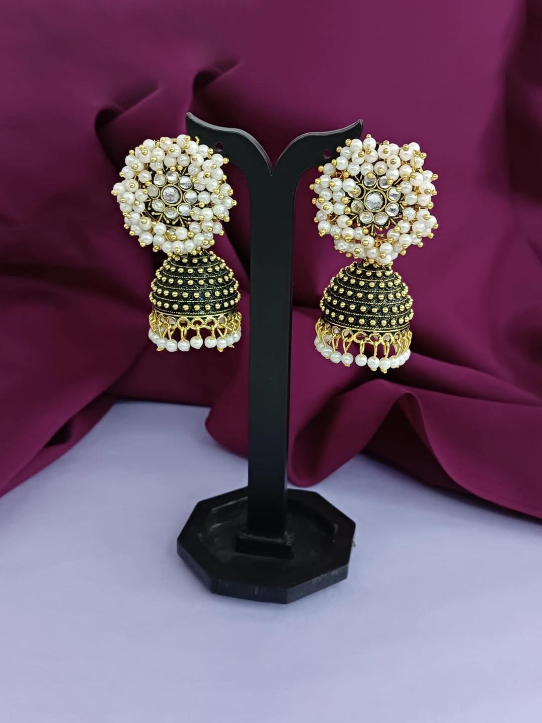 

Efulgenz Gold-Plated Floral Oxidized Jhumkas