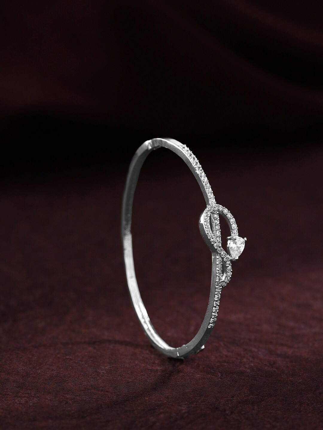 

Priyaasi Silver-Plated American Diamond Studded Bangle-Style Bracelet