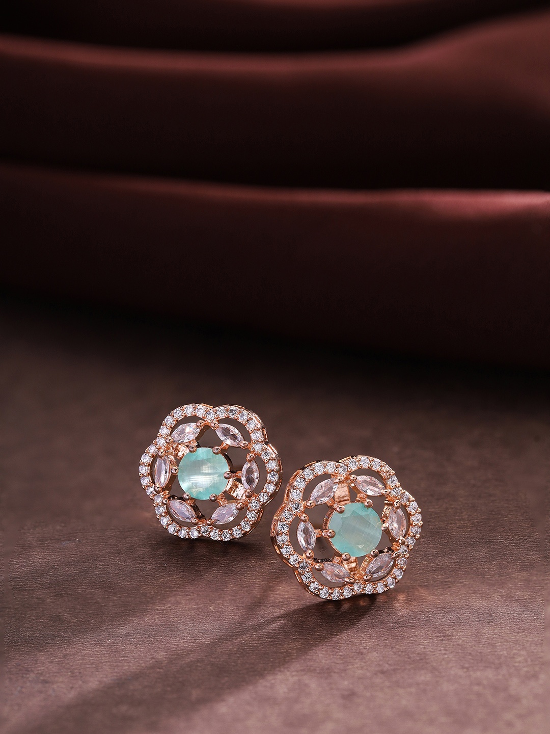 

Priyaasi Teal Rose Gold-Plated Contemporary Stud Earrings