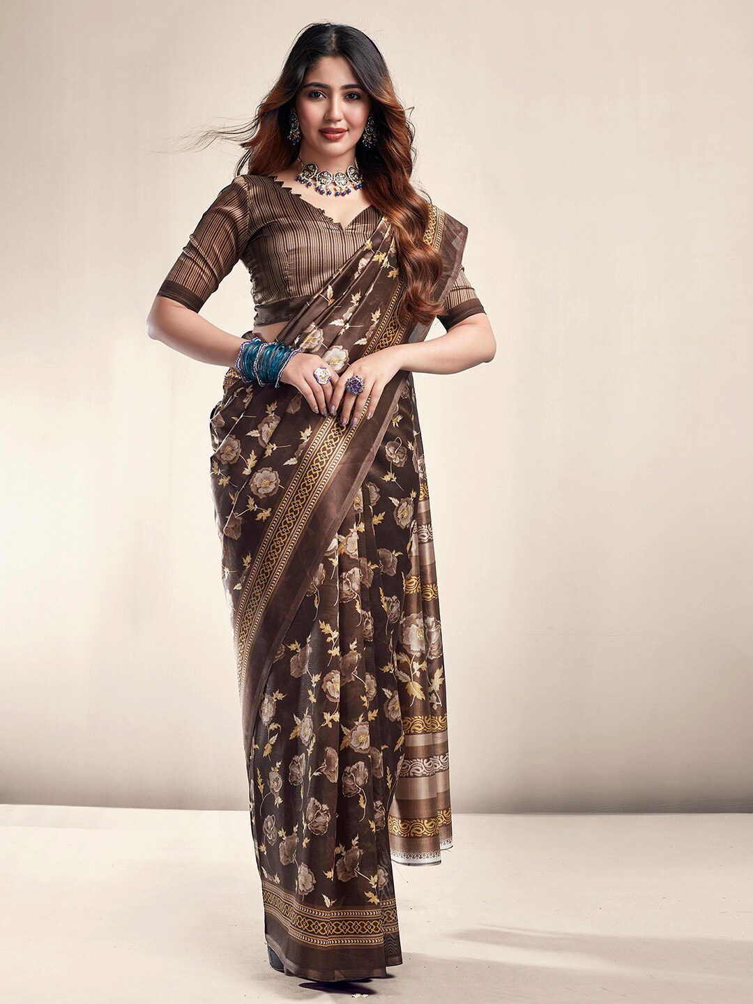 

KALINI Brown & Orange Floral Printed Saree