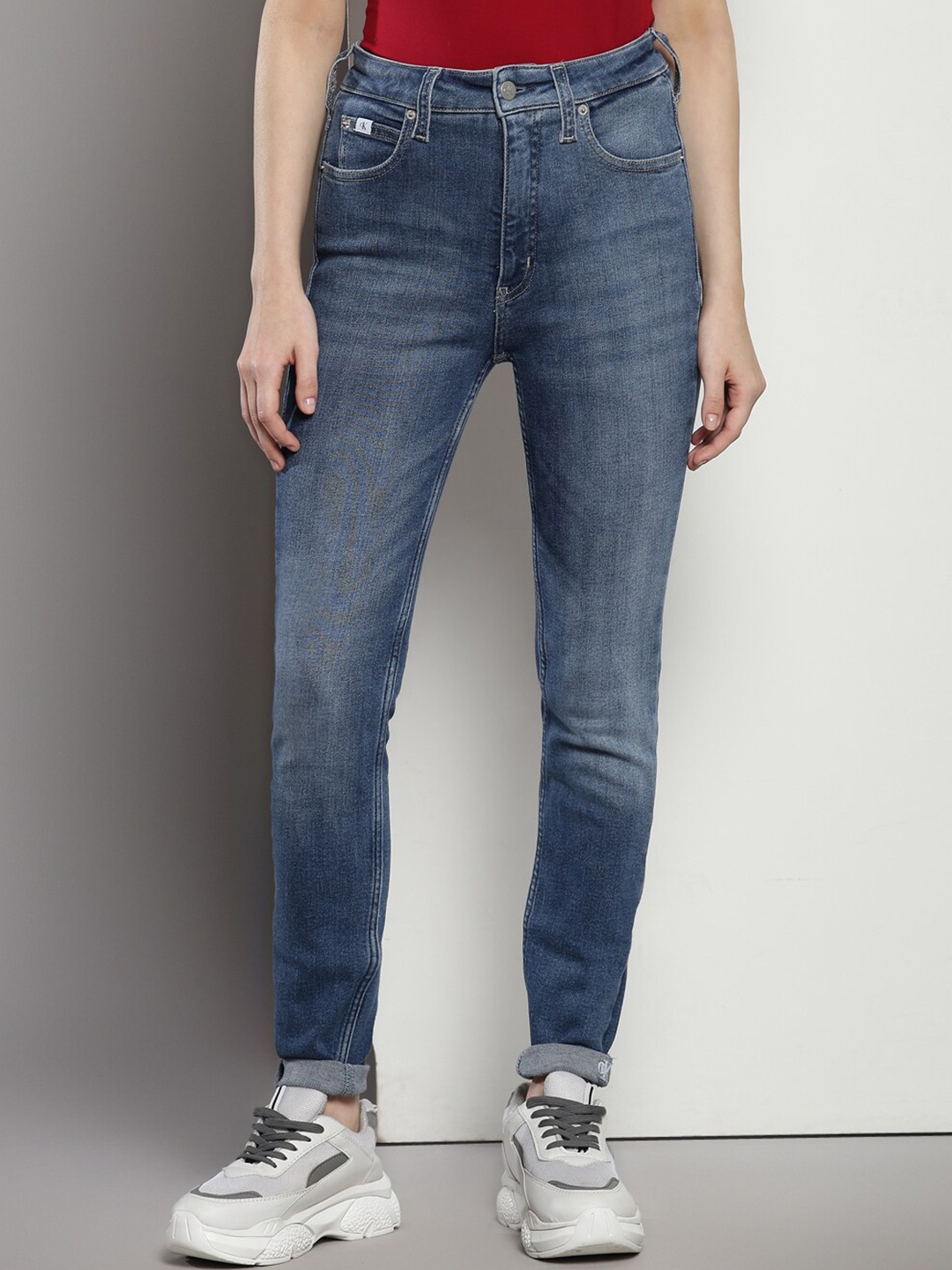 

Calvin Klein Women Super Skinny Fit High-Rise Light Fade Jeans, Blue