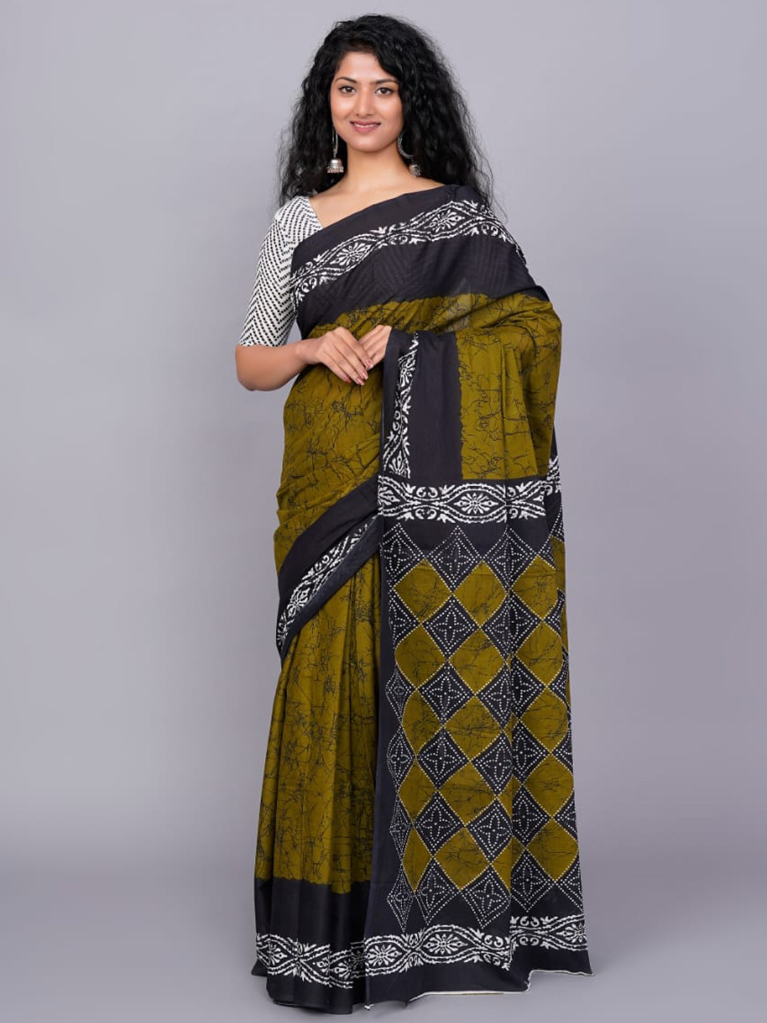 

clothonus Batik Print Jaipuri Cotton Ikat Saree, Green