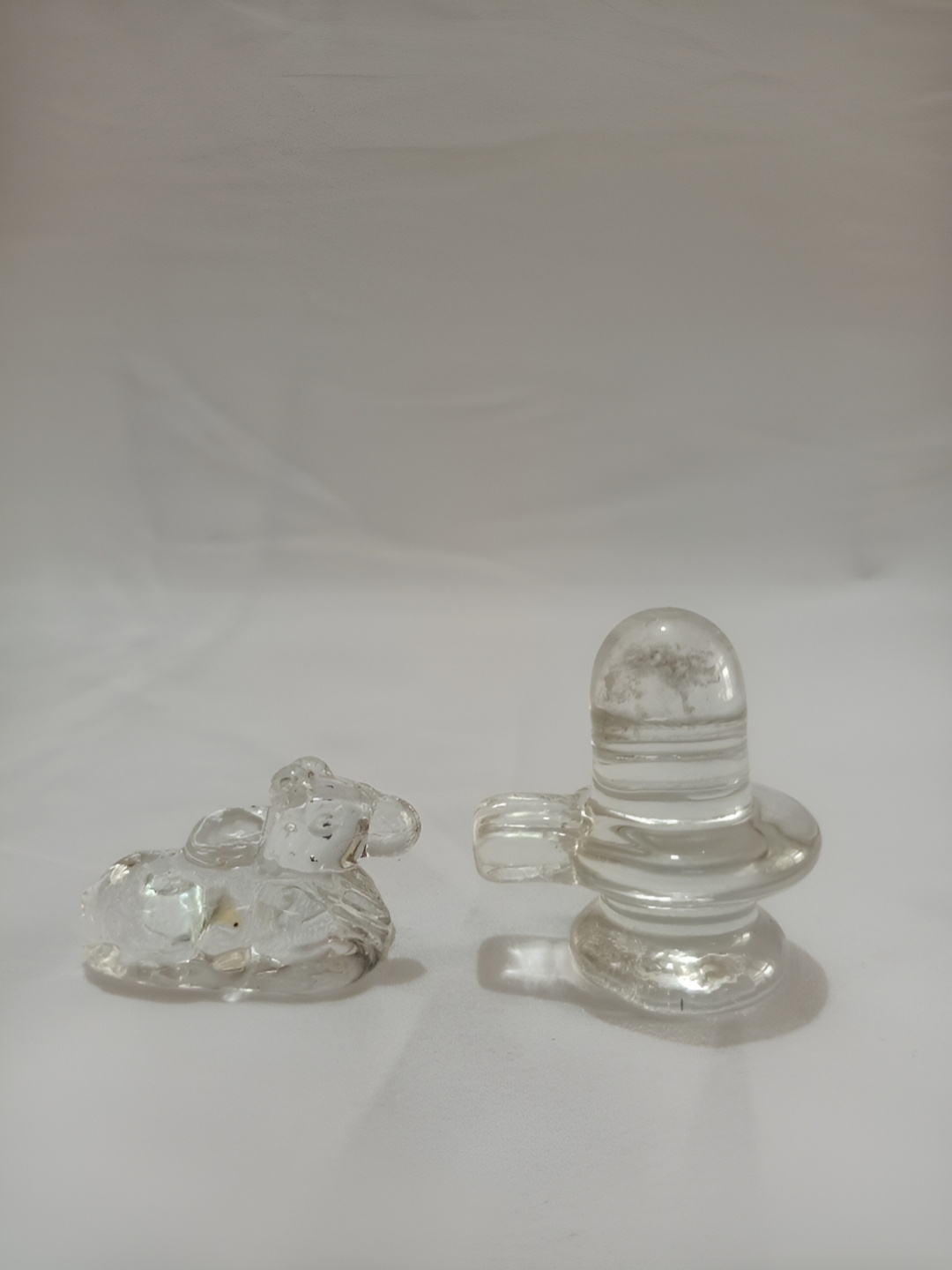 

Navyaksh Transparent Shivling & Nandi Showpiece