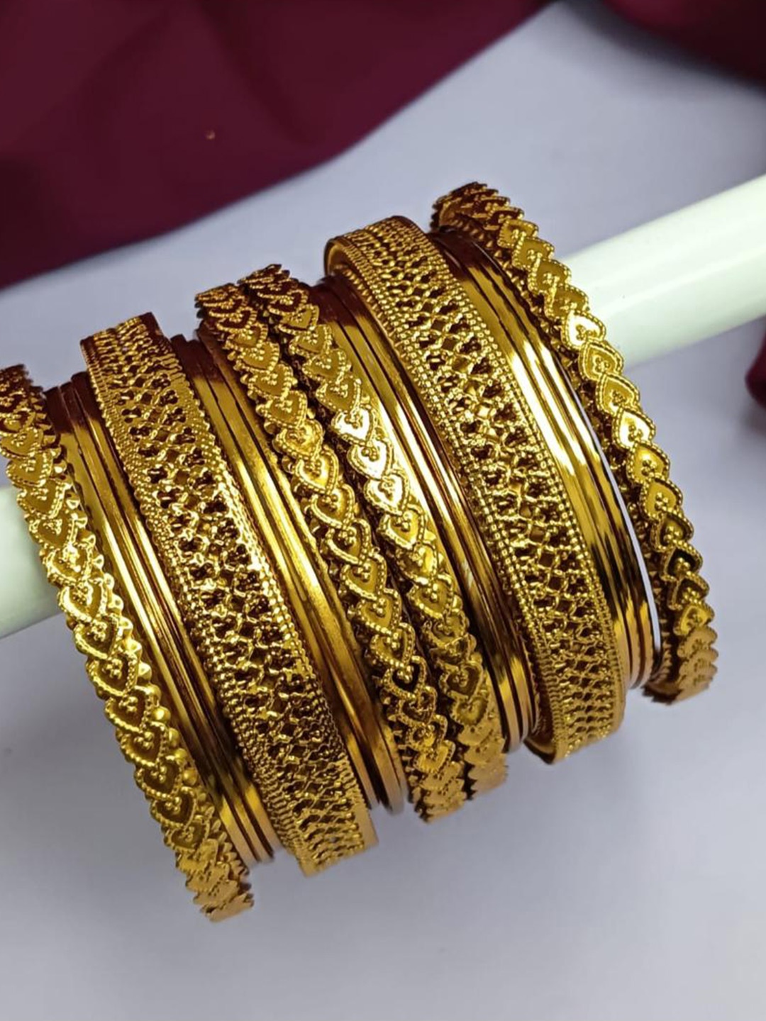 

Efulgenz Set of 18 Gold-Plated Oxidized Metal Bangles