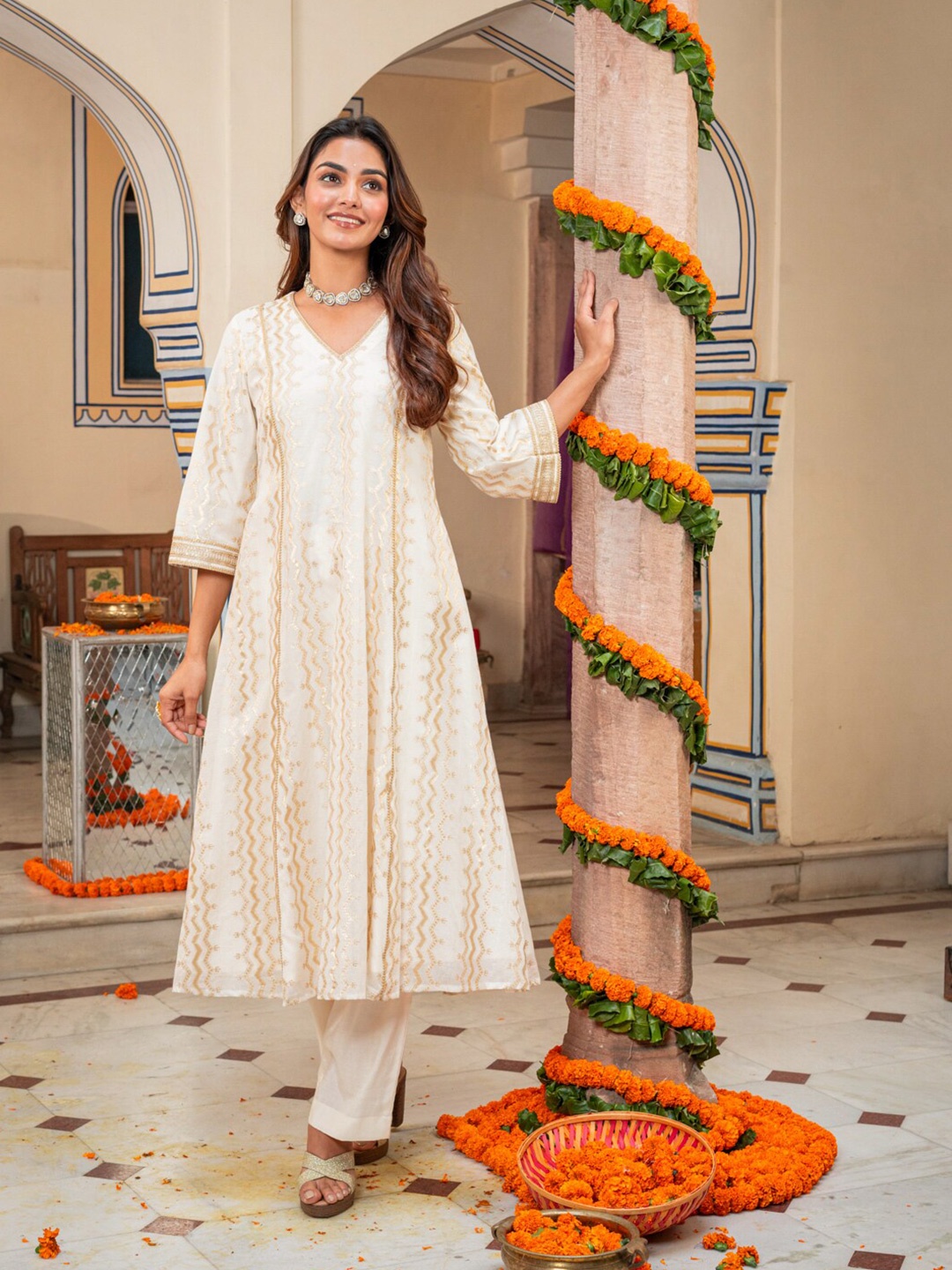 

Ambraee Ethnic Motifs Self Design V-Neck Regular A-Line Flared Kurta With Trousers, Off white