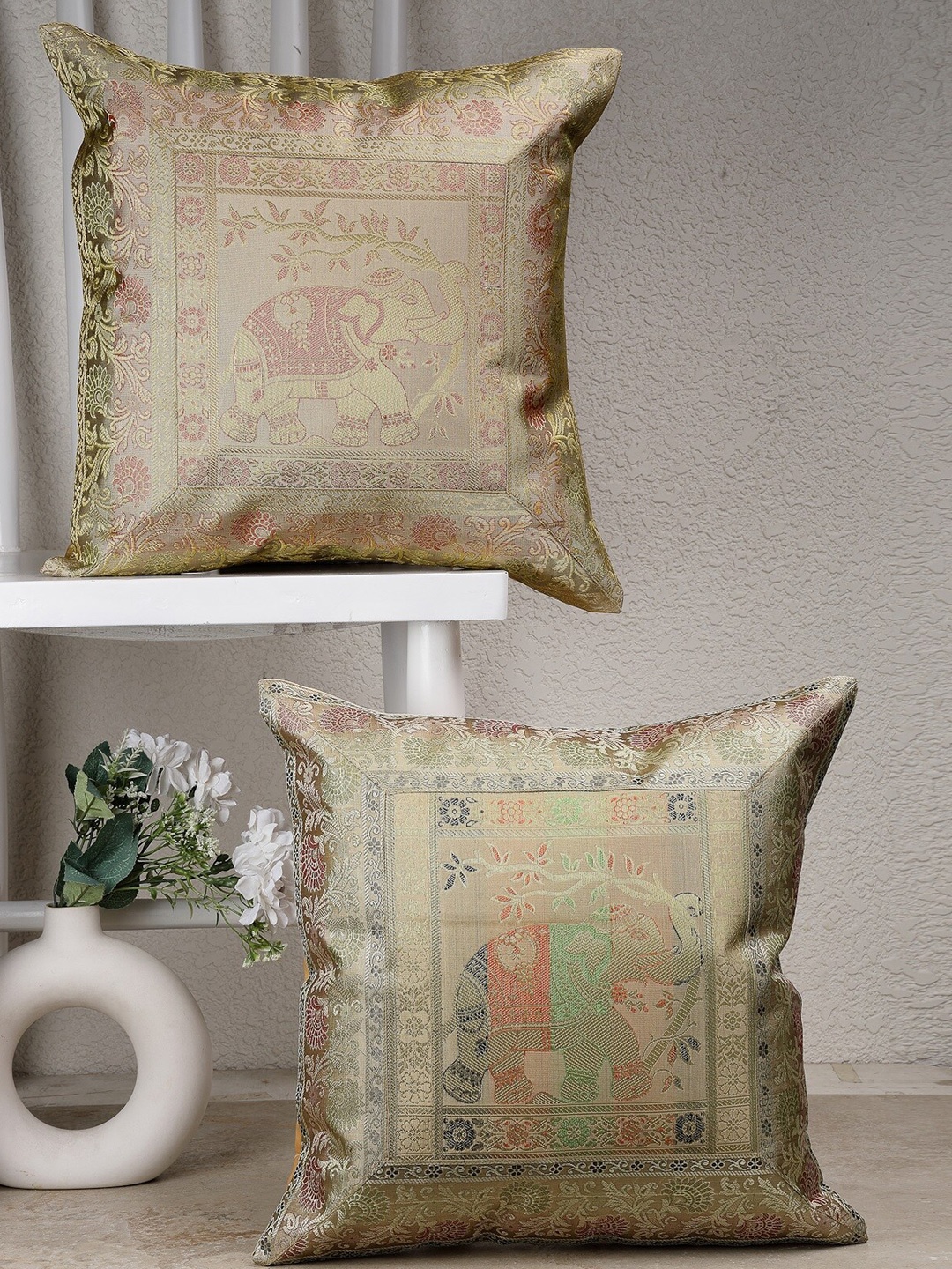 

Dhrohar Beige & Green 2 Pieces Ethnic Motifs Brocade Square Shaped Cushion Covers