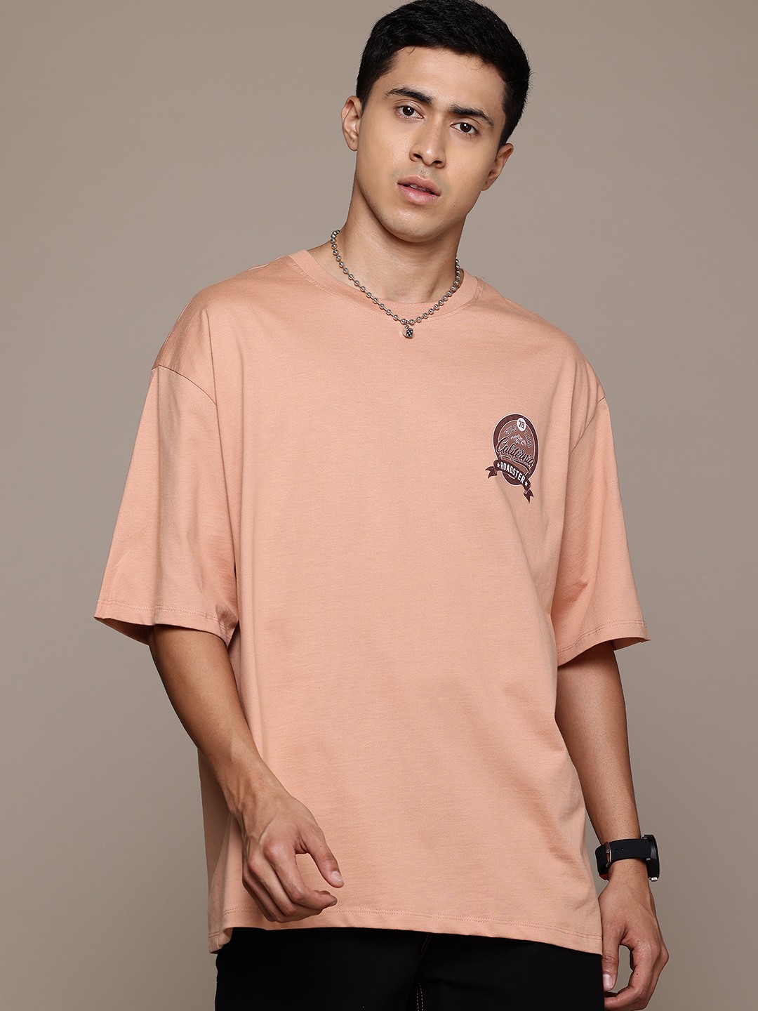 

The Roadster Lifestyle Co. Men Printed Pure Cotton Relaxed Fit T-shirt, Peach