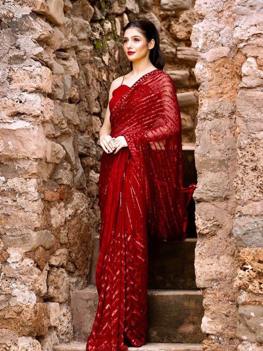 

FABIAN FASHION Red Embellished Sequinned Pure Georgette Saree