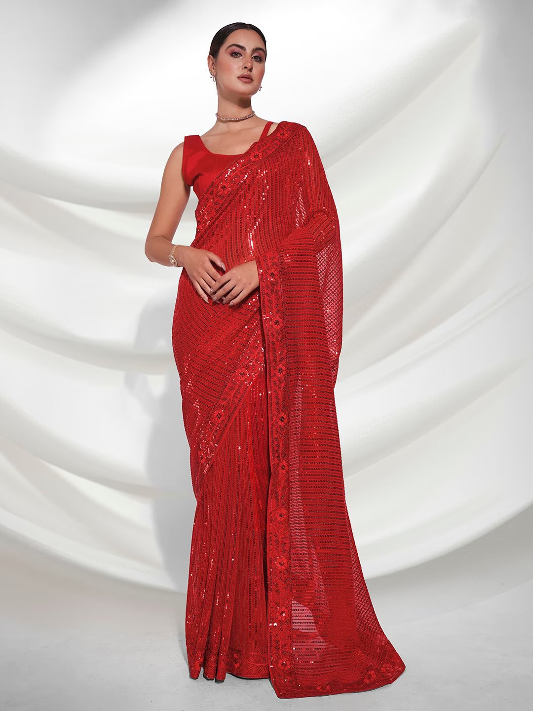 

FABIAN FASHION Red & GoldToned Embellished Sequinned Georgette Saree