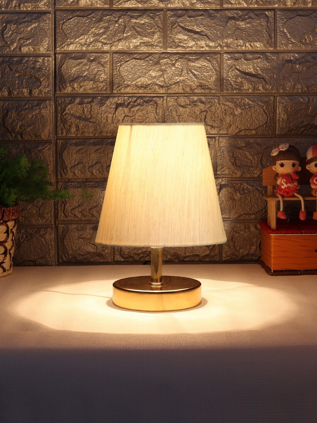 

Devansh Off White Textured Table Lamp