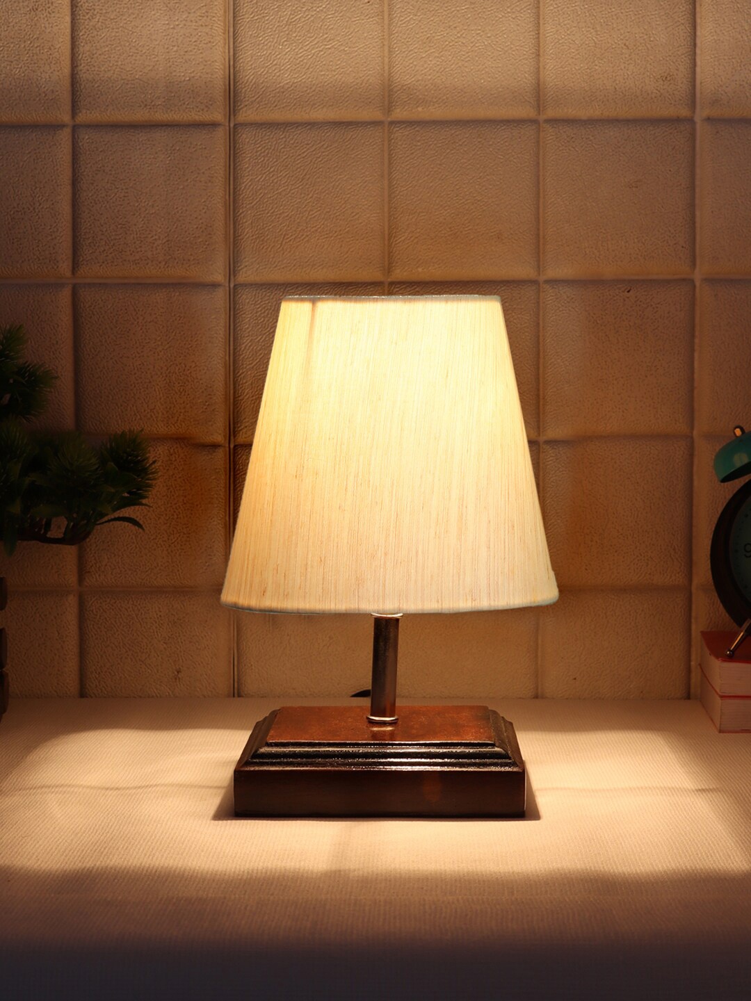 

Devansh Off White Textured Table Lamp