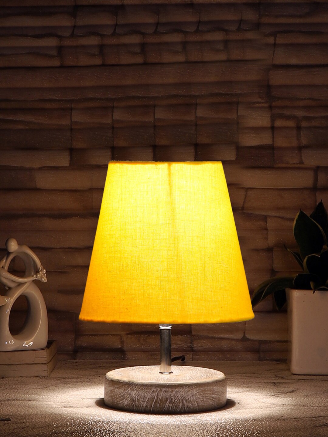 

Devansh Yellow Textured Wooden Table Lamp