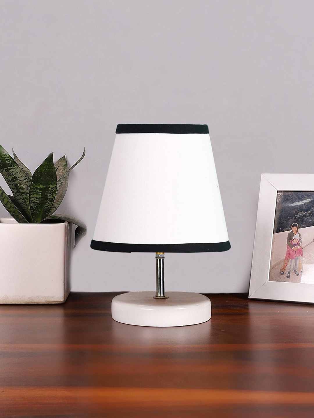 

Devansh White & Black cotton Solid Wooden Table Lamp