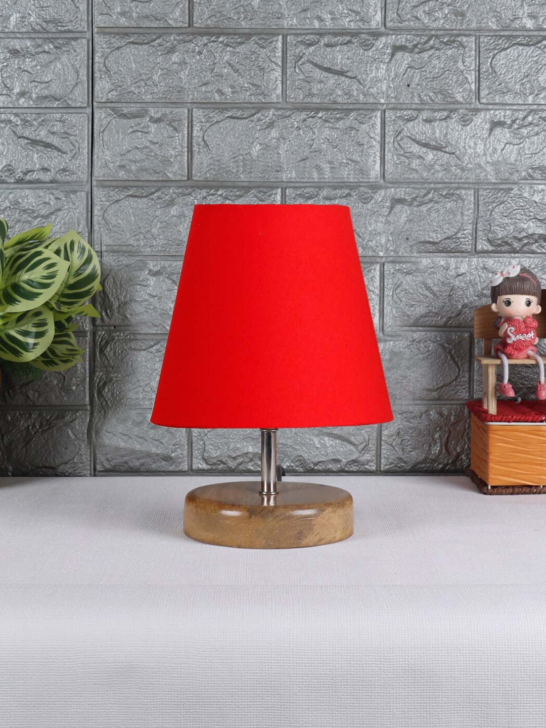

Devansh Red & Brown Wooden Contemporary Table Lamp