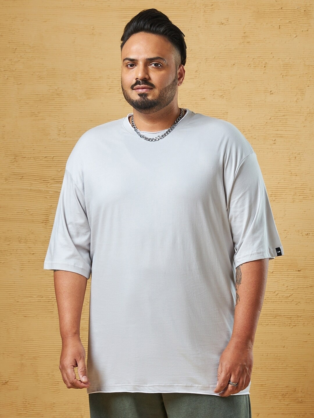 

Bewakoof Plus Plus Size Drop-Shoulder Sleeves Oversized Casual T-shirt, Blue