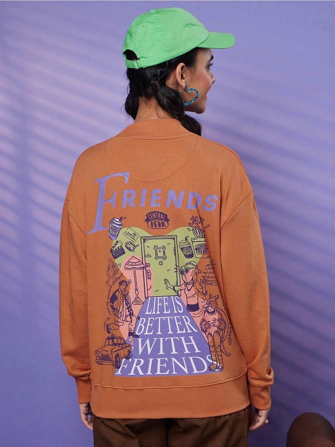 

Bewakoof Friends Graphic Printed Oversized Pullover Sweatshirt, Orange