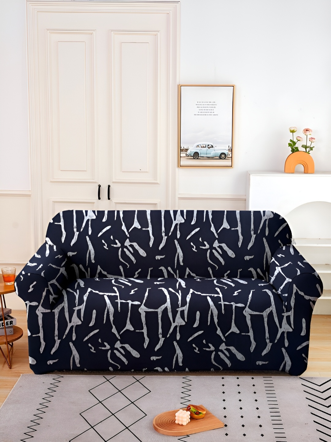 

Aura Black & White Printed Stretchable 2 Seater Sofa Cover With Arms