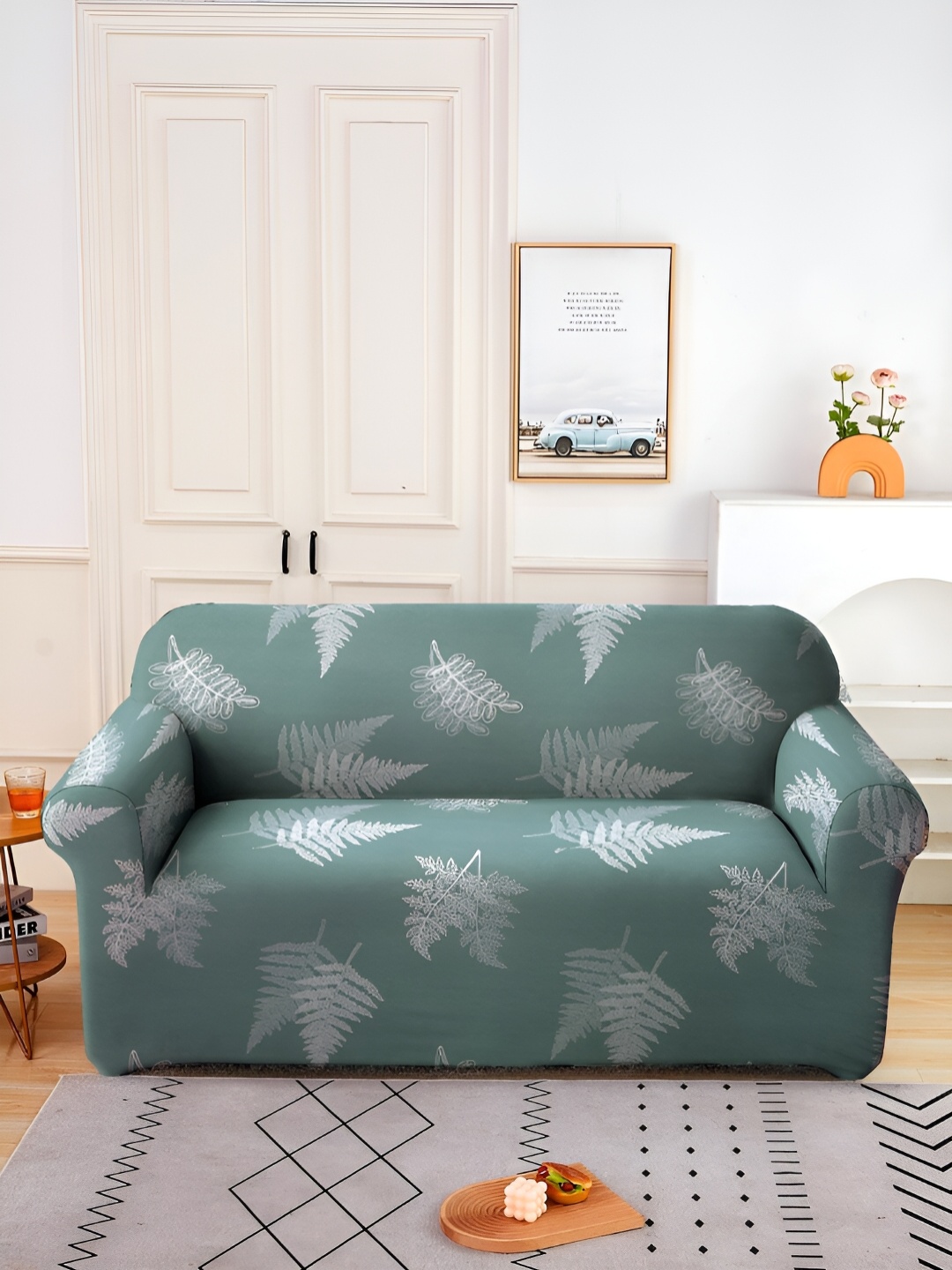 

Aura Green & White Printed Stretchable Two Seater Sofa Cover