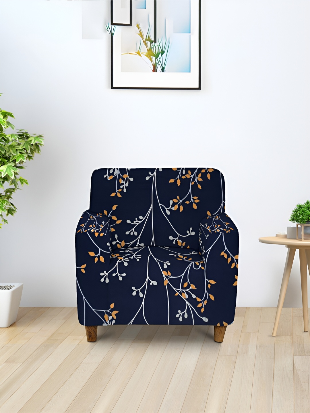 

Aura Navy Blue & Orange Printed Stretchable One Seater Sofa Cover