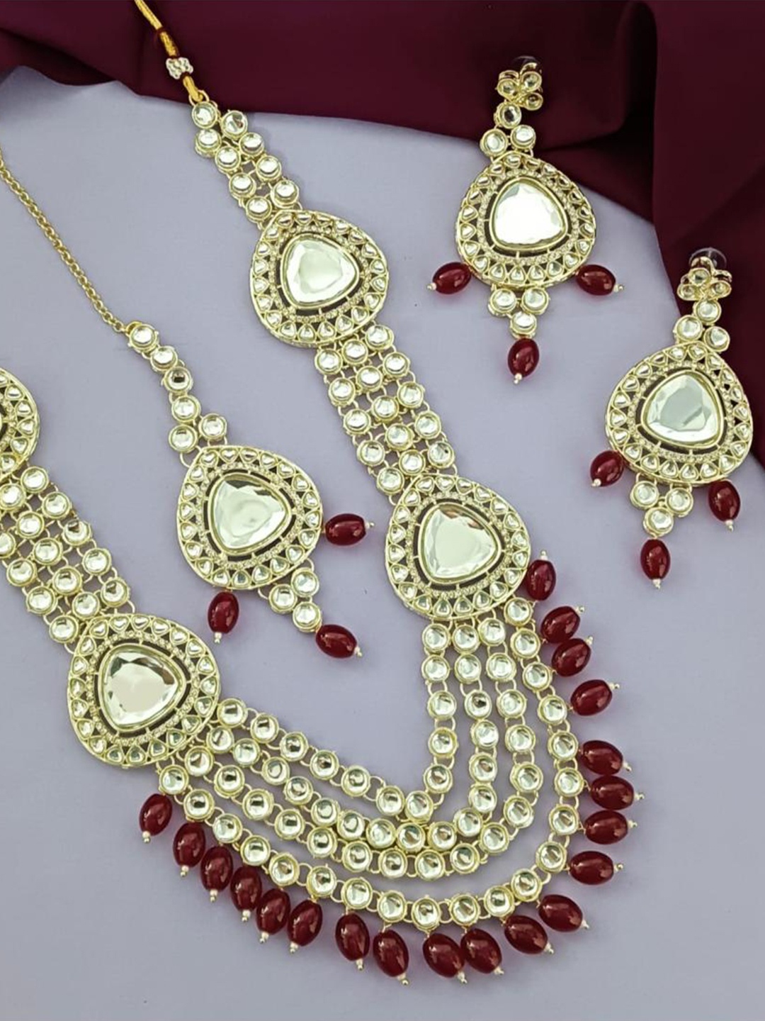 

Efulgenz Gold-Plated Crystal Kundan Jewellery Set