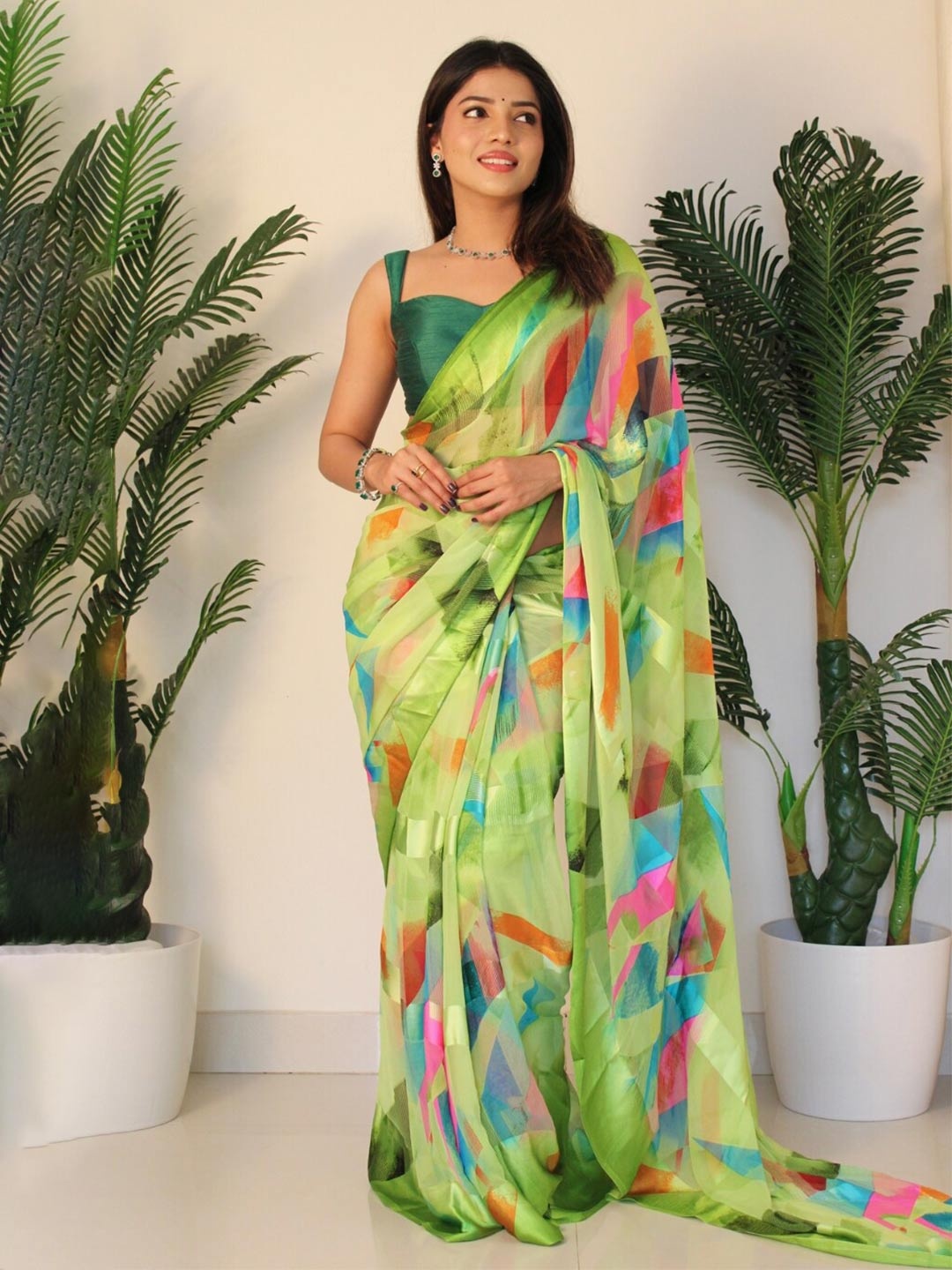 

Sitanjali Abstract Printed Pure Georgette Saree, Green